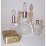 A small late Victorian cut glass and silver mounted scent bottle;