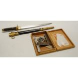 A Masonic ceremonial dagger, having 23cm single edged blade,