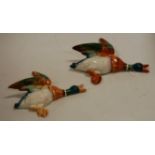 A pair of Beswick flying duck wall ornaments model No.