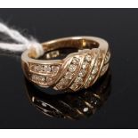 A modern 9ct gold multi-diamond set dress ring,