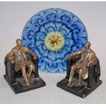 A pair of cast metal book-ends,