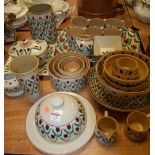 An extensive collection of Nicholas Moss pottery tablewares, to include; graduated bowls, large jug,