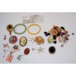 A small collection of assorted costume jewellery, to include; jadeite bangle, faux pearl set brooch,