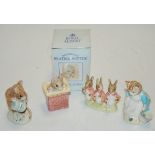 Four Royal Albert Beatrix Potter figures, to include; Tom Kitten, Hunka-Munka spills the beads,