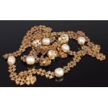 A gilt metal and baroque cultured pearl set necklace by Miriam Haskell,