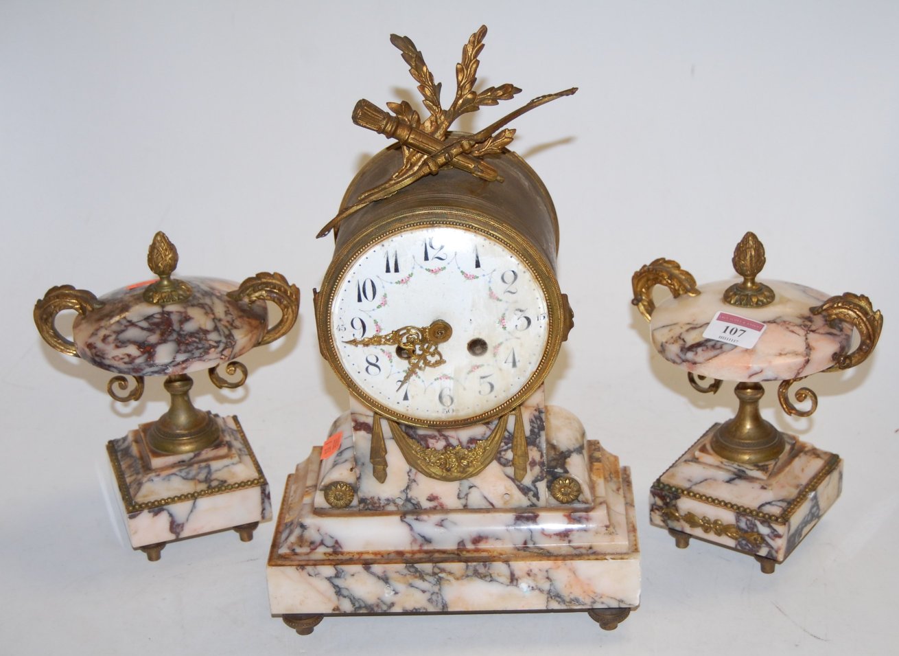 A late 19th century French brass cased drum shape mantel clock,