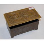 A Jacobs & Co biscuit tin, in the form of a Dutch coffer, the embossed brass lid with figural scene,