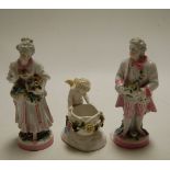 An early 20th century Continental porcelain figure of a lady carrying flowers,