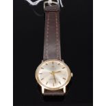 A gents Tissot Seastar 7 Visodate 9ct gold cased wrist watch having signed champagne dial,