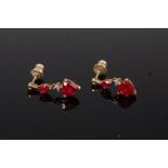 A pair of 9ct gold ruby and diamond point set ear pendants