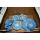A small collection of Wedgwood blue jasper wares to include pin dishes, trinket jar,