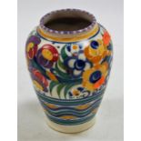 A Poole pottery vase of squat baluster form, typically decorated with flowers,