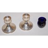 A pair of modern sterling silver dwarf table candlesticks,