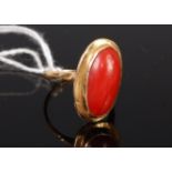 A ladies 18ct gold and cabochon coral set dress ring, 4.