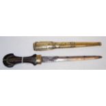 An Eastern dagger, having engraved steel blade, brass inlaid wooden handle,