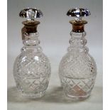 A pair of modern hobnail cut glass decanters, each with silver collar and mushroom stopper, h.