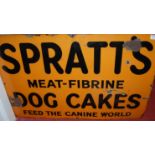 A mid-20th century enamelled advertising sign for Spratt's Meat Fibrine Dog Cakes,