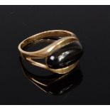 An 8ct gold and black onyx set dress ring, stamped 333, 3.