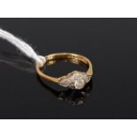 An 18ct gold diamond solitaire ring, the illusion set old brilliant weighing approx. 0.2ct, 2.