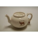A Poutneys of Bristol white lace teapot with transfer decoration The Milk Bar,