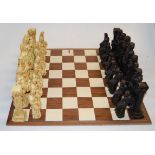 A studio Ann Carlton resin chess set,
