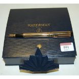 A Waterman's 'night and day' fountain pen, having 18ct gold nib, boxed,
