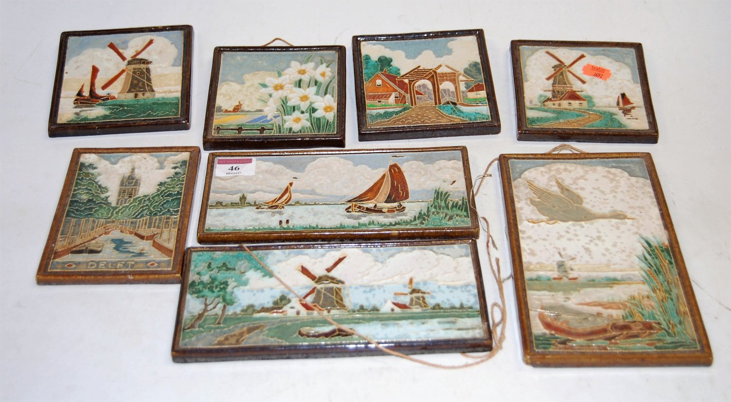 A collection of eight Delft tiles,