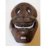 A Nepalese carved softwood tribal mask