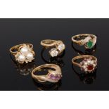 Three various modern 9ct gold semi precious set dress rings,