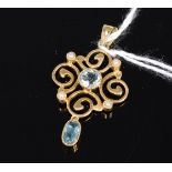 A ladies 15ct gold aquamarine and seed pearl set openwork pendant, 2.1g, 2.