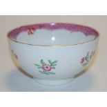 An early 19th century English soft paste porcelain slop bowl with floral decoration,