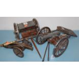 A collection of miscellaneous items to include; scale model cannons, Roy Kirkham Toby jug,