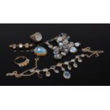 Assorted moonstone set costume jewellery to include necklace, two rings, bar brooch,