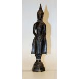 A 20th century lead figure of a Thai goddess in standing pose, h.
