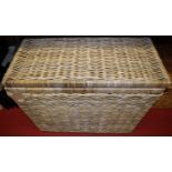 A wicker blanket chest