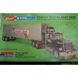 Three boxed road transport plastic kits to include a 1/25 scale Revel Peter built 359 lorry,