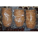Four sets of five wicker circular candy baskets