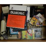 A collection of Commodore 64 computer games and accessories, to include control unit,