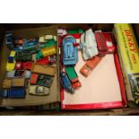 A large quantity of mixed playworn Corgi and Dinky toys one example is part boxed,