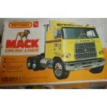 Three various boxed road transport plastic kits to include a Matchbox AMT Mack Cruiseliner,