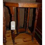 An Edwardian walnut octagonal occasional table