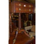 A Regency style mahogany and crossbanded dropflap pedestal two drawer work table
