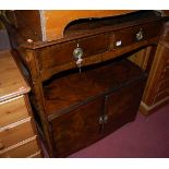 A circa 1900 figured walnut and ebony strung buffet side cupboard, having twin upper drawers, w.