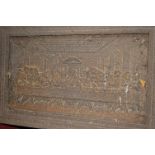 A cast iron plaque depicting the Last Supper,