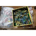 A large quantity of mixed and loose plastic figures to include Airfix, Tinpo, Britains and others,