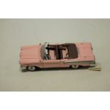 A boxed Franklin Mint 1/24 scale model of a 1958 Edsel Citation finished in pink