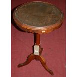 A Victorian walnut circular pedestal occasional table