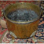 A 19th century brass and iron bound twin handled circular coal bucket