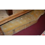 A late Victorian mustard upholstered buttonback day-bed,