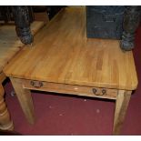 A 19th century and later French pine and light oak topped round cornered farmhouse kitchen table,